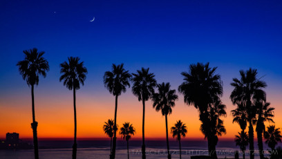 Sunset, Moon, Venus, at La Jolla Shores is a photograph by T.M. Schultze taken at ,