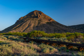 Round Mountain Sunset is a photograph by T.M. Schultze taken at , California