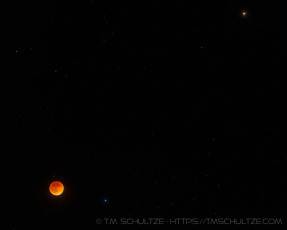 Lunar Eclipse, Spica, and Mars is a photograph by T.M. Schultze taken 2014 at , California