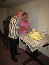 Cake-cutting at their 50th wedding anniversary
