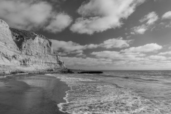 Torrey Beach is a photograph by T.M. Schultze taken at Torrey Pines State Natural Reserve, California