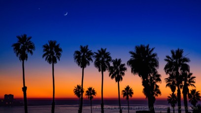 Sunset, Moon, Venus, at La Jolla Shores is a photograph by T.M. Schultze taken at ,