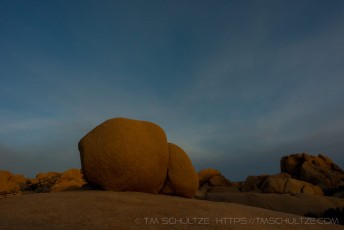 Sunkissed Clearing Morning Clouds is a photograph by T.M. Schultze taken at Joshua Tree National Park, California