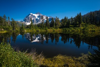 Highwood Reflections is a photograph by T.M. Schultze taken 2013 at Mt Baker National Recreation Area, Washington
