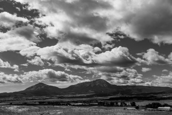 Spanish Peaks, Summer Monsoons, Black and White is a photograph by T.M. Schultze taken at ,