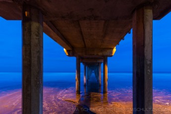 Peer Underneath is a photograph by T.M. Schultze taken 2016 at San Diego, California