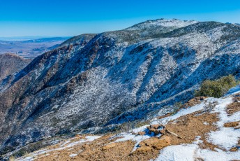 Granite And Snowpack is a photograph by T.M. Schultze taken at Mount Laguna, California