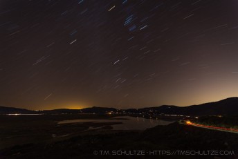 Trails Above Lake Henshaw is a photograph by T.M. Schultze taken at Lake Henshaw, California