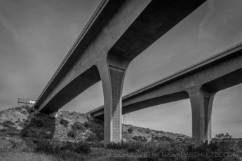 Highway 52 Over Spring Canyon, Black and White is a photograph by T.M. Schultze taken at San Diego, California