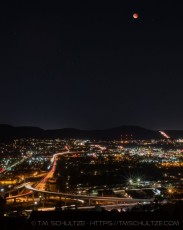Lunar Eclipse Over Santee 2 is a photograph by T.M. Schultze taken at Santee, California