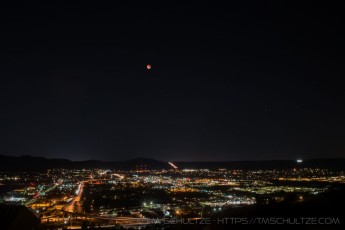Lunar Eclipse Over Santee is a photograph by T.M. Schultze taken at ,