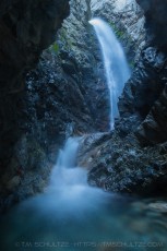 is a photograph by T.M. Schultze taken at Zapata Falls, Colorado