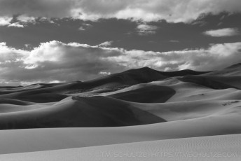 is a photograph by T.M. Schultze taken at Great Sand Dunes National Park, Colorado