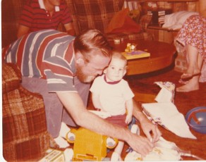 July 1978 - My grandfather helping me celebrate my first birthday, incidentally my brother was born on that day.