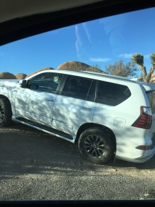 Yep, People Get Their Cars Stuck Parking Like This (Taken Christmas Eve)